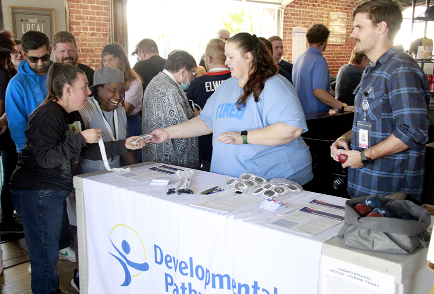 "Elections staff hand out information to voters with disabilities"